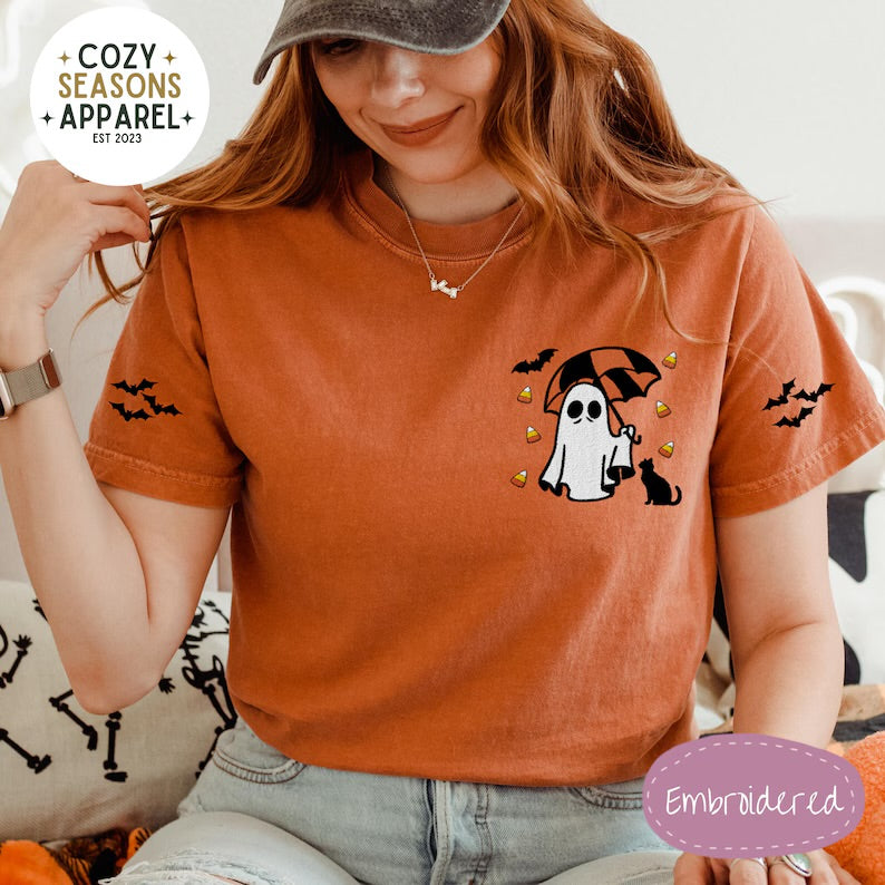 Embroidered Comfort Colors Halloween Shirt - Spooky Umbrella Holding Umbrella with Raining Candy Corn & Cute Black Cat with Bat Sleeves