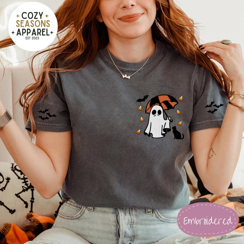 Embroidered Comfort Colors Halloween Shirt - Spooky Umbrella Holding Umbrella with Raining Candy Corn & Cute Black Cat with Bat Sleeves