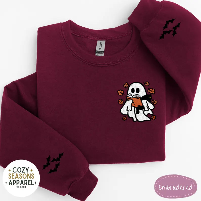 Embroidered Halloween Book Sweatshirt - Spooky Ghost Reading a Book Holding Black Cat in the Fall with Bat Sleeves